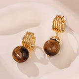 À qui offrir des boucles d'oreilles Œil de Tigre ? - Biloria