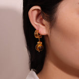 À qui offrir des boucles d'oreilles Œil de Tigre ? - Biloria