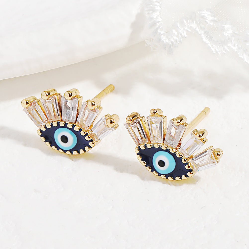 Boucles d'oreilles œil protecteur en cristal doré - Biloria