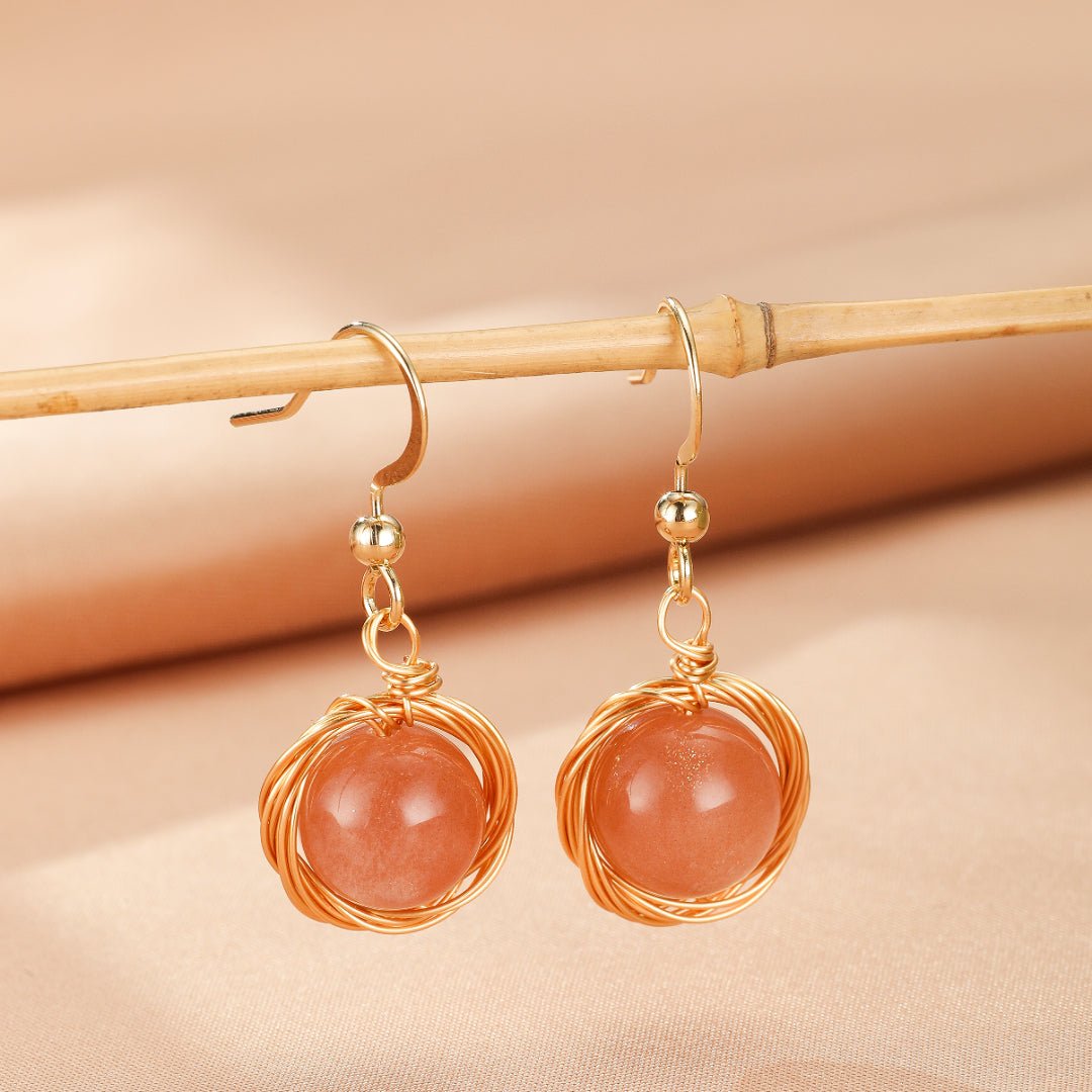 Boucles d'Oreilles Pierre de Soleil – Nid Protecteur - Biloria