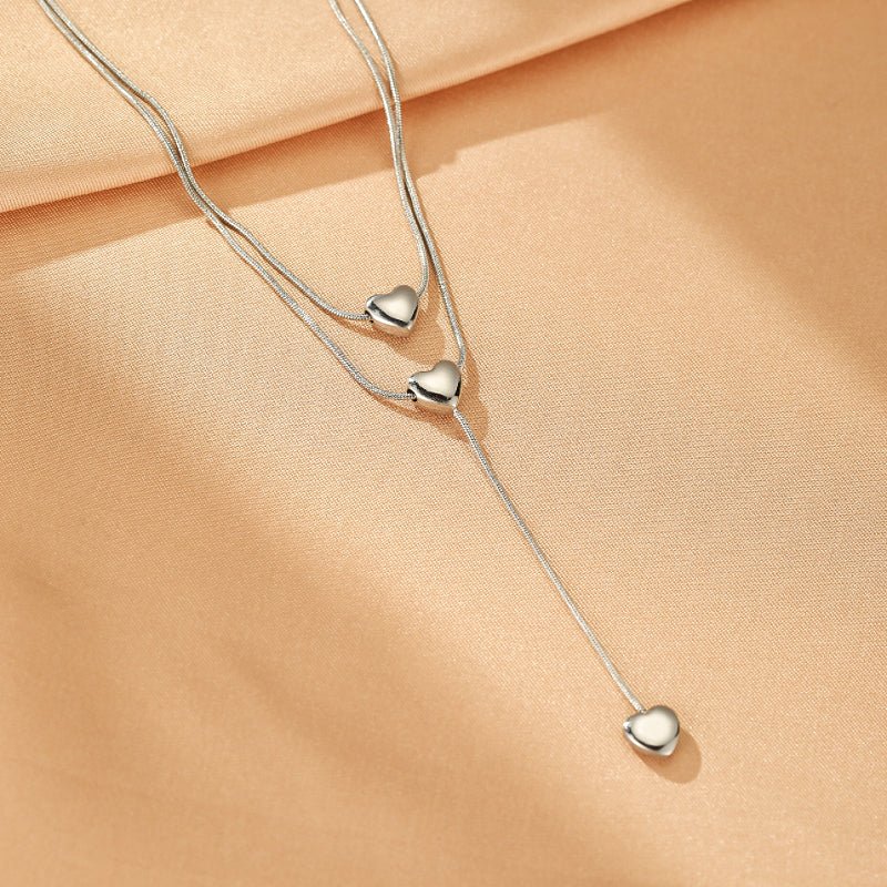 Collier Cœur Cascade d'Amour en Acier Doré - Biloria