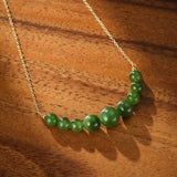 Collier en Jade Vert Arc de Joie en Laiton Doré - Biloria