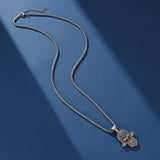 Collier Main de Fatma Protection Acier Titane - Biloria